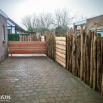 Schutting, overkapping en tuinpoort Guttecoven